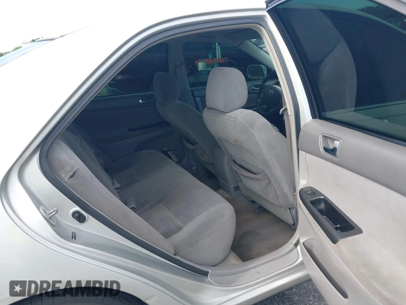 2005 Toyota Camry LE with VIN 4T1BE30K35U572110, listed as a IAAI auction lot 42674324 with 147,480 mi miles and . Bid and sale history available at DreamBid. Image 8.