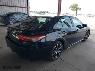 2018 Toyota Camry LE with VIN 4T1B11HK8JU575695, listed as a IAAI auction lot 41857828 with 180,413 mi miles. Bid and sale history available at carsss.com. Image 4.