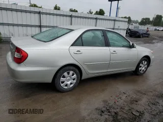 2004 Toyota Camry LE z VIN 4T1BE32K34U919799, wystawiony jako Copart lot #56546535 z przebiegiem 75 033 mil mil oraz Szkoda całkowita • Salvage title. Historia ofert i sprzedaży dostępna na DreamBid. Obrazek 3.