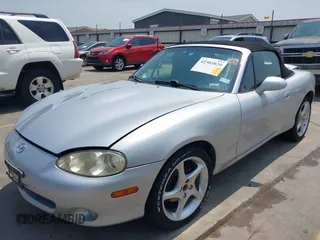 2002 Mazda MX-5 Miata Cloth z VIN JM1NB353020225252, wystawiony jako IAAI lot #42303820 z przebiegiem 194 549 mil mil oraz . Historia ofert i sprzedaży dostępna na DreamBid. Obrazek 2.