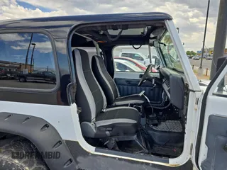 1993 Jeep Wrangler S z VIN 1J4FY19P5PP261872, wystawiony jako Copart lot #58435955 z przebiegiem 127 959 mil mil oraz Czysty tytuł • Clean title. Historia ofert i sprzedaży dostępna na DreamBid. Obrazek 5.