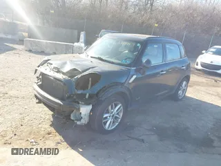 2012 MINI Countryman S with VIN WMWZC5C52CWL62574, listed as a IAAI auction lot 41768196 with 159,816 mi miles and . Bid and sale history available at DreamBid. Image 2.