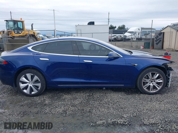 2017 Tesla Model S 100D with VIN 5YJSA1E25HF184502, listed as a IAAI auction lot 41834310 with 92,887 mi miles and . Bid and sale history available at DreamBid. Image 14.
