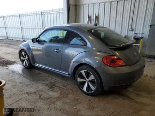 2012 Volkswagen Beetle 2.0T Turbo PZEV with VIN 3VWVA7AT1CM656081, listed as a Copart auction lot 43027995 with 63,802 mi miles and Clean Title. Bid and sale history available at carsss.com. Image 2.