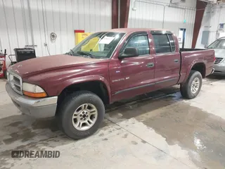 2001 Dodge Dakota Sport with VIN 1B7GG2AN71S209614, listed as a IAAI auction lot 42066349 with 242,675 mi miles. Bid and sale history available at carsss.com. Image 2.