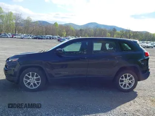 2014 Jeep Cherokee Sport with VIN 1C4PJLAB4EW110051, listed as a IAAI auction lot 41961698 with 153,570 mi miles and . Bid and sale history available at DreamBid. Image 14.