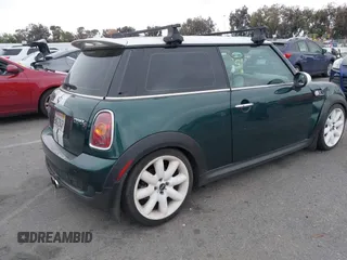 2009 MINI Hardtop S with VIN WMWMF735X9TT94065, listed as a IAAI auction lot 42183487 with 141,746 mi miles and . Bid and sale history available at DreamBid. Image 4.