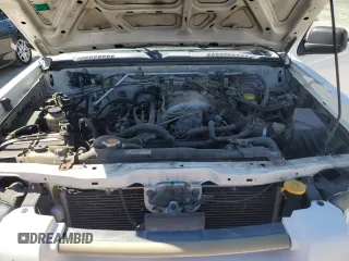 2004 Nissan Frontier XE z VIN 1N6ED27T04C479222, wystawiony jako Copart lot #50957035 z przebiegiem 198 723 mil mil oraz Czysty tytuł • Clean title. Historia ofert i sprzedaży dostępna na DreamBid. Obrazek 11.