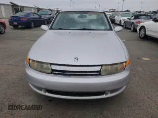 2002 Saturn LS z VIN 1G8JW54R32Y517171, wystawiony jako Copart lot #74849884 z przebiegiem Nie podano mil oraz Szkody całkowita. Historia ofert i sprzedaży dostępna na DreamBid. Obrazek 5.