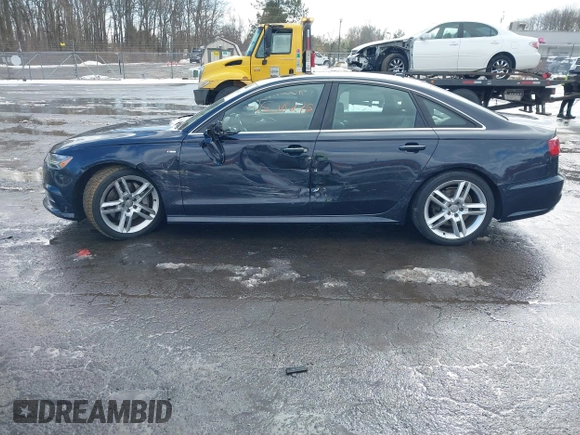 2016 Audi A6 Premium Plus with VIN WAUGFAFC9GN014767, listed as a IAAI auction lot 41508275 with 113,167 mi miles and . Bid and sale history available at DreamBid. Image 14.