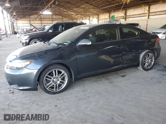 2005 Scion tC with VIN JTKDE177950027533, listed as a Copart auction lot 77613954 with 179,691 mi miles and Salvage Title. Bid and sale history available at carsss.com. Image 1.