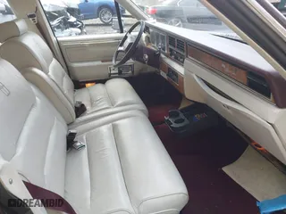 1987 Lincoln Town Car with VIN 1LNBM81F5HY704217, listed as a IAAI auction lot 41855678 with 86,794 mi miles. Bid and sale history available at carsss.com. Image 5.