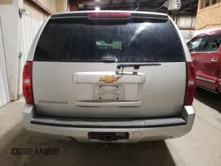 2013 Chevrolet Suburban LS with VIN 1GNSKHE72DR263672, listed as a Copart auction lot 87855905 with 124,081 mi miles and Salvage Title. Bid and sale history available at carsss.com. Image 6.