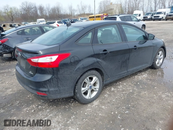 2013 Ford Focus SE with VIN 1FADP3F25DL211678, listed as a IAAI auction lot 42160699 with 193,272 mi miles. Bid and sale history available at carsss.com. Image 4.