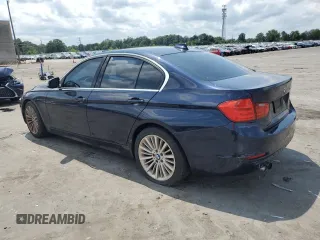 2012 BMW 3 Series 328i with VIN WBA3A5C52CF257206, listed as a Copart auction lot 62765794 with 147,995 mi miles and Salvage Title. Bid and sale history available at carsss.com. Image 2.