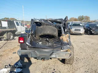 2019 Jeep Wrangler Unlimited Sport S with VIN 1C4HJXDGXKW500313, listed as a IAAI auction lot 41022680 with 82,864 mi miles and . Bid and sale history available at DreamBid. Image 16.