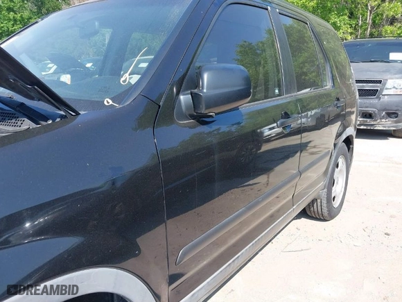 2006 Honda CR-V LX with VIN JHLRD68516C023523, listed as a IAAI auction lot 42053159 with 154,344 mi miles. Bid and sale history available at carsss.com. Image 6.