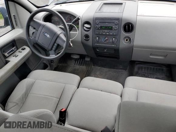2007 Ford F-150 XL with VIN 1FTRF12287NA48062, listed as a Copart auction lot 55933815 with 113,308 mi miles and Salvage title. Bid and sale history available at DreamBid. Image 8.