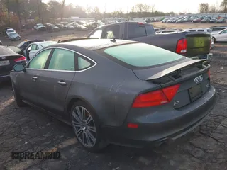 2014 Audi A7 Prestige с VIN WAU2GAFC0EN080435, выставлен на аукционе IAAI как лот 41208743 с пробегом 78 554 миль миль и . История ставок и продаж доступна на DreamBid. Изображение 3.