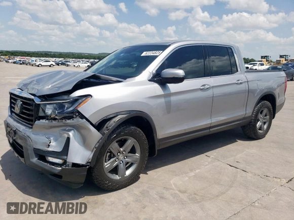 2021 Honda Ridgeline RTL-E with VIN 5FPYK3F73MB008806, listed as a Copart auction lot 62234825 with 84,716 mi miles and Salvage title. Bid and sale history available at DreamBid. Image 1.