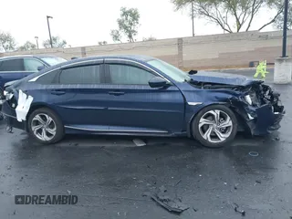 2018 Honda Accord EX z VIN 1HGCV1F47JA069523, wystawiony jako IAAI lot #42188564 z przebiegiem 94 703 mil mil oraz . Historia ofert i sprzedaży dostępna na DreamBid. Obrazek 13.