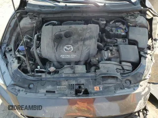 2015 Mazda 3 i Sport z VIN 3MZBM1K77FM124850, wystawiony jako Copart lot #64770645 z przebiegiem 91 485 mil mil oraz Szkoda całkowita • Salvage title. Historia ofert i sprzedaży dostępna na DreamBid. Obrazek 11.