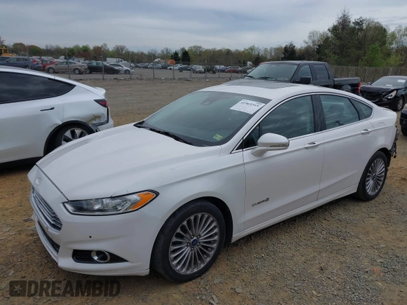 2013 Ford Fusion Titanium Hybrid with VIN 3FA6P0RU5DR357469, listed as a IAAI auction lot 41969315 with 215,732 mi miles. Bid and sale history available at carsss.com. Image 2.