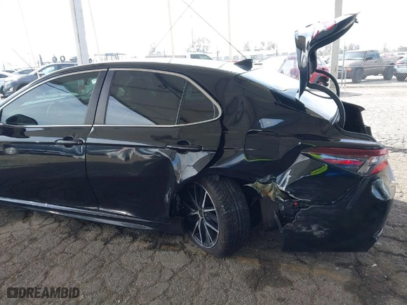 2021 Toyota Camry SE Nightshade with VIN 4T1T11AKXMU552275, listed as a IAAI auction lot 41813796 with 80,889 mi miles. Bid and sale history available at carsss.com. Image 6.