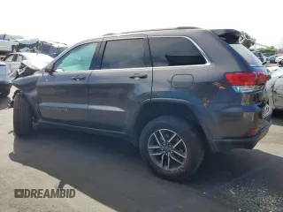 2019 Jeep Grand Cherokee Altitude with VIN 1C4RJFAG5KC591141, listed as a Copart auction lot 56885105 with 88,000 mi miles and Salvage title. Bid and sale history available at DreamBid. Image 2.
