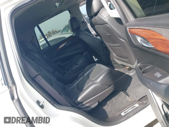 2015 Cadillac Escalade Premium z VIN 1GYS3NKJ1FR553712, wystawiony jako IAAI lot #41660900 z przebiegiem 93 423 mil mil oraz . Historia ofert i sprzedaży dostępna na DreamBid. Obrazek 8.