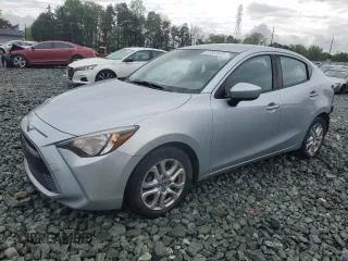2018 Toyota Yaris with VIN 3MYDLBYV2JY329621, listed as a Copart auction lot 52351815 with 127,195 mi miles and Salvage Title. Bid and sale history available at DreamBid. Image 1.