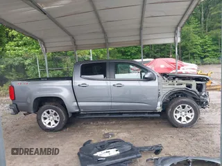2018 Chevrolet Colorado 4WD LT z VIN 1GCGTCEN6J1146104, wystawiony jako IAAI lot #42338356 z przebiegiem 71 043 mil mil oraz . Historia ofert i sprzedaży dostępna na DreamBid. Obrazek 14.