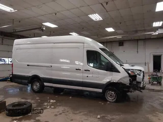 2017 Ford Transit z VIN 1FTYR3XM7HKA08504, wystawiony jako IAAI lot #41607977 z przebiegiem 621 328 mil mil oraz . Historia ofert i sprzedaży dostępna na DreamBid. Obrazek 14.