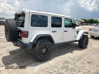 2021 Jeep Wrangler Unlimited Rubicon with VIN 1C4JJXFG1MW849460, listed as a Copart auction lot 62701895 with 54,517 mi miles and Salvage title. Bid and sale history available at DreamBid. Image 3.