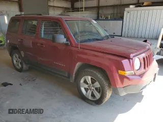 2014 Jeep Patriot Latitude with VIN 1C4NJRFB3ED792919, listed as a Copart auction lot 66043945 with 142,224 mi miles and Salvage title. Bid and sale history available at DreamBid. Image 4.