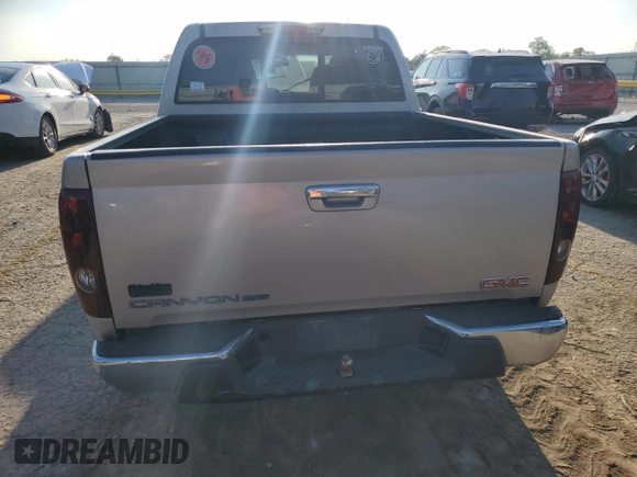 2009 GMC Canyon SLE2 with VIN 1GTCS13E198133272, listed as a Copart auction lot 70970464 with 124,171 mi miles and Salvage Title. Bid and sale history available at carsss.com. Image 6.