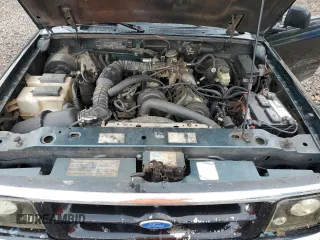 1996 Ford Ranger XL z VIN 1FTCR10A3TUC37158, wystawiony jako Copart lot #64003065 z przebiegiem 219 982 mil mil oraz Szkoda całkowita • Salvage title. Historia ofert i sprzedaży dostępna na DreamBid. Obrazek 11.