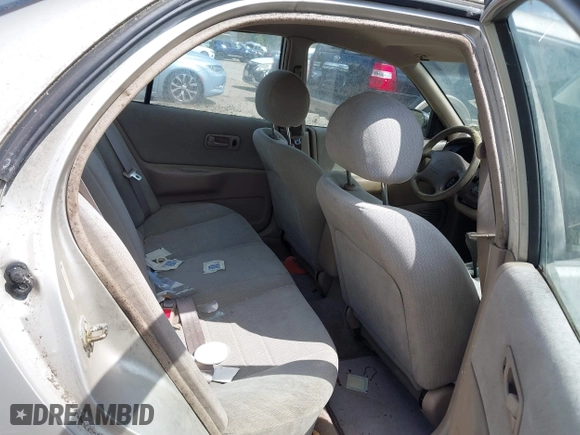 1997 Nissan Altima XE with VIN 1N4BU31D8VT205299, listed as a IAAI auction lot 42081935 with 235,426 mi miles. Bid and sale history available at carsss.com. Image 8.