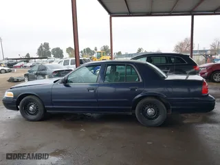 2001 Ford Crown Victoria Police Pkg Police Interceptor with VIN 2FAFP71WX1X127347, listed as a IAAI auction lot 41134745 with 161,180 mi miles. Bid and sale history available at carsss.com. Image 14.