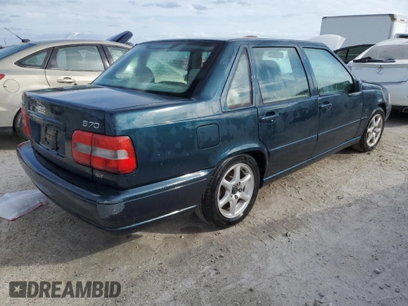 1998 Volvo S70 z VIN YV1LS5675W3511553, wystawiony jako Copart lot #75102454 z przebiegiem Nie podano mil oraz Szkody całkowita. Historia ofert i sprzedaży dostępna na DreamBid. Obrazek 3.