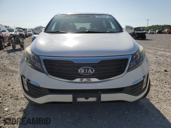 2012 Kia Sportage LX with VIN KNDPBCA21C7233424, listed as a Copart auction lot 61829465 with 129,526 mi miles and Salvage title. Bid and sale history available at DreamBid. Image 5.
