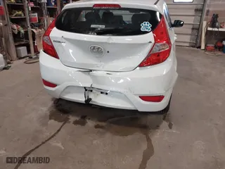 2013 Hyundai Accent GL with VIN KMHCT5AE1DU088241, listed as a IAAI auction lot 41909194 with 87,622 mi miles. Bid and sale history available at carsss.com. Image 6.