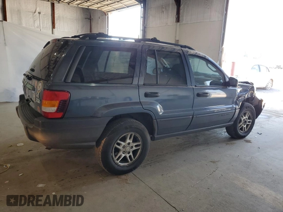 2004 Jeep Grand Cherokee Laredo z VIN 1J4GW48S14C338788, wystawiony jako Copart lot #53136715 z przebiegiem 150 352 mil mil oraz Szkoda całkowita • Salvage title. Historia ofert i sprzedaży dostępna na DreamBid. Obrazek 3.