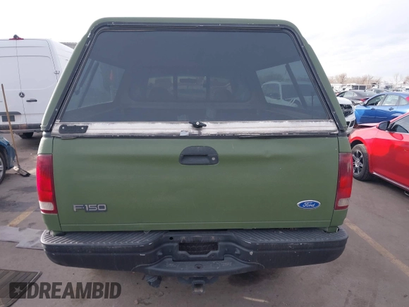 1997 Ford F-150 XL with VIN 1FTDX1861VKA60604, listed as a IAAI auction lot 41060909 with 269,715 mi miles. Bid and sale history available at carsss.com. Image 16.