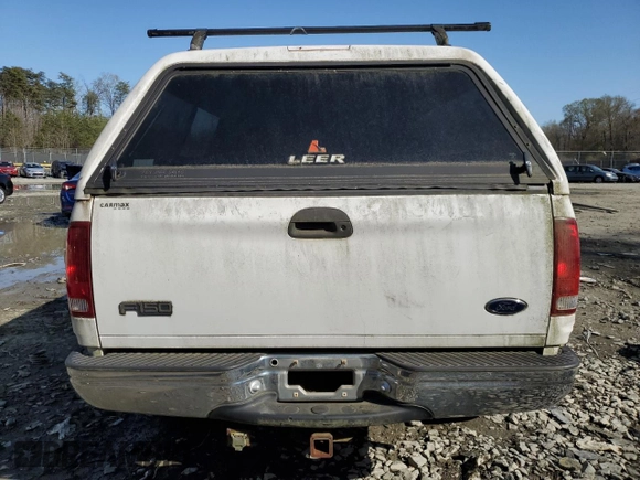 1999 Ford F-150 XL with VIN 1FTRX18L1XNB18305, listed as a Copart auction lot 51336985 with 173,904 mi miles and Clean Title. Bid and sale history available at carsss.com. Image 6.