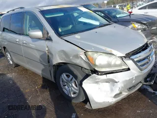 2007 Honda Odyssey EX-L z VIN 5FNRL38727B044899, wystawiony jako IAAI lot #41727015 z przebiegiem 213 742 mil mil oraz . Historia ofert i sprzedaży dostępna na DreamBid. Obrazek 1.