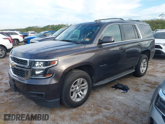 2017 Chevrolet Tahoe LT with VIN 1GNSKBKC3HR206093, listed as a IAAI auction lot 40602629 with 161,740 mi miles and . Bid and sale history available at DreamBid. Image 17.