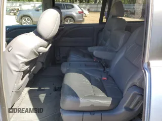2005 Honda Odyssey EX-L z VIN 5FNRL386X5B034514, wystawiony jako Copart lot #52702435 z przebiegiem 65 988 mil mil oraz Szkoda całkowita • Salvage title. Historia ofert i sprzedaży dostępna na DreamBid. Obrazek 11.