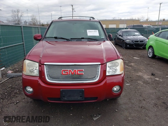 2006 GMC Envoy Denali with VIN 1GKET63M762119339, listed as a IAAI auction lot 41837443 with 192,458 mi miles. Bid and sale history available at carsss.com. Image 12.