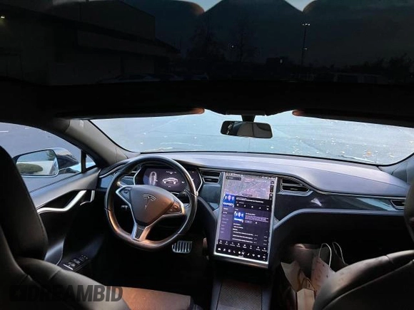 2017 Tesla Model S 60 with VIN 5YJSA1E15HF219286, listed as a Copart auction lot 57360515 with 44,520 mi miles and Salvage title. Bid and sale history available at DreamBid. Image 9.